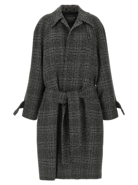 Overcoat by Balenciaga for women in cupro wool black showcases a enveloping silhouette, detailed with distinctive pockets and a enveloping .
