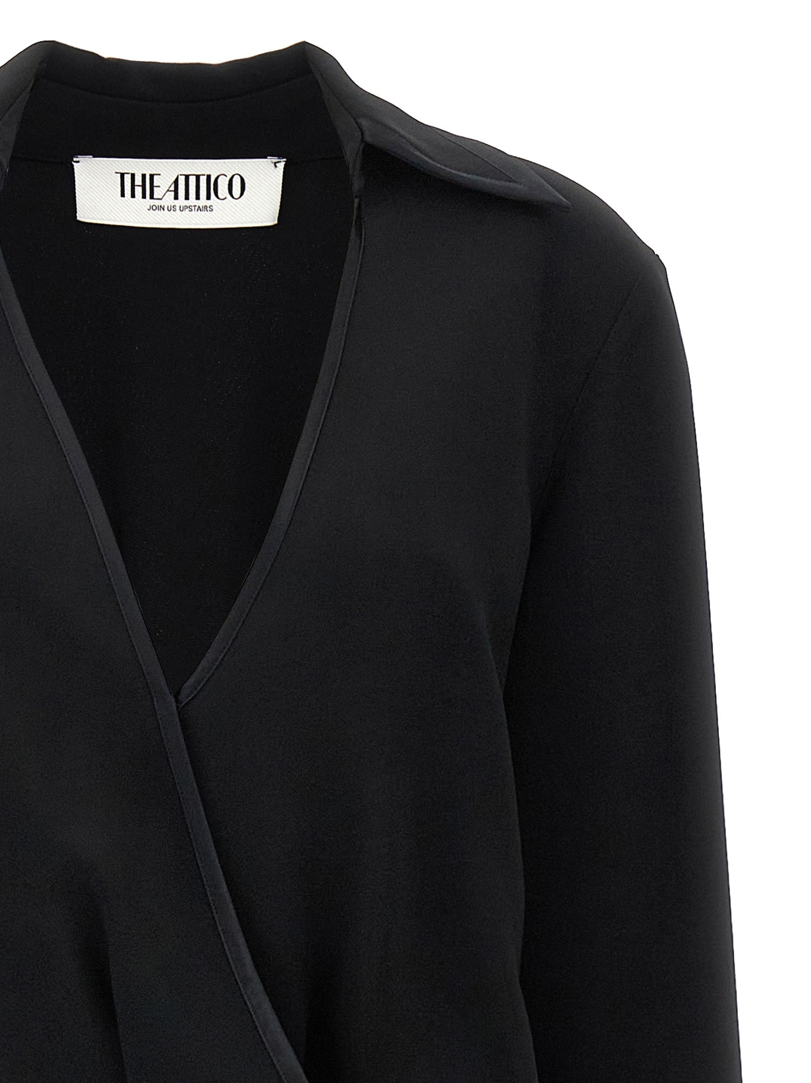 Dress by The Attico for women in marabou acrylic viscose satin black features an cute silhouette, detailed with a and v-neck neckline that elegantly flows into a cute midi.