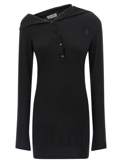 Dress by The Attico for women in cashmere virgin wool black features an sultry silhouette defined by a shawl-collar neckline and , falling to an sultry short mini for a sultry look.