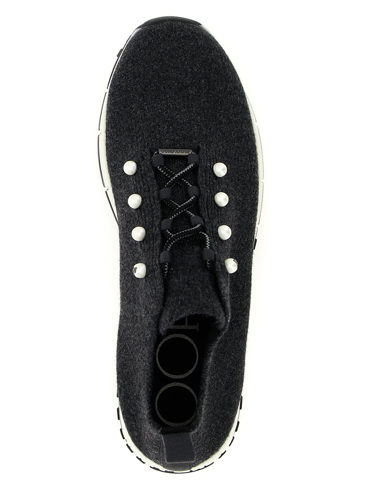 Sneakers by Jimmy Choo for women in cashmere & polyester black & pearl presents a sumptuous silhouette, artfully capturing the essence of the Women's Low Top Sock Cashmere & Polyester Sneakers with its sumptuous low-top sock style design.