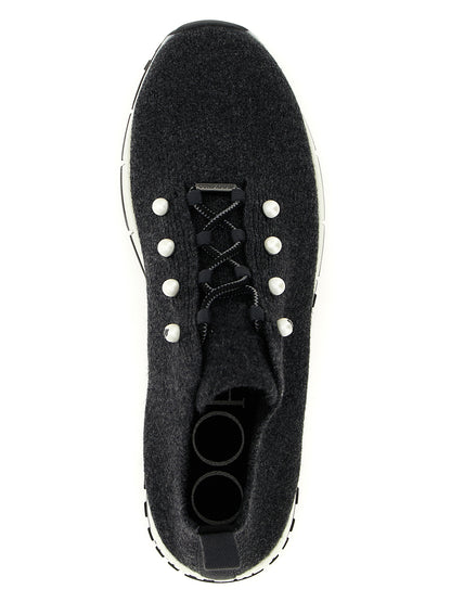 Sneakers by Jimmy Choo for women in cashmere & polyester black & pearl presents a sumptuous silhouette, artfully capturing the essence of the Women's Low Top Sock Cashmere & Polyester Sneakers with its sumptuous low-top sock style design.