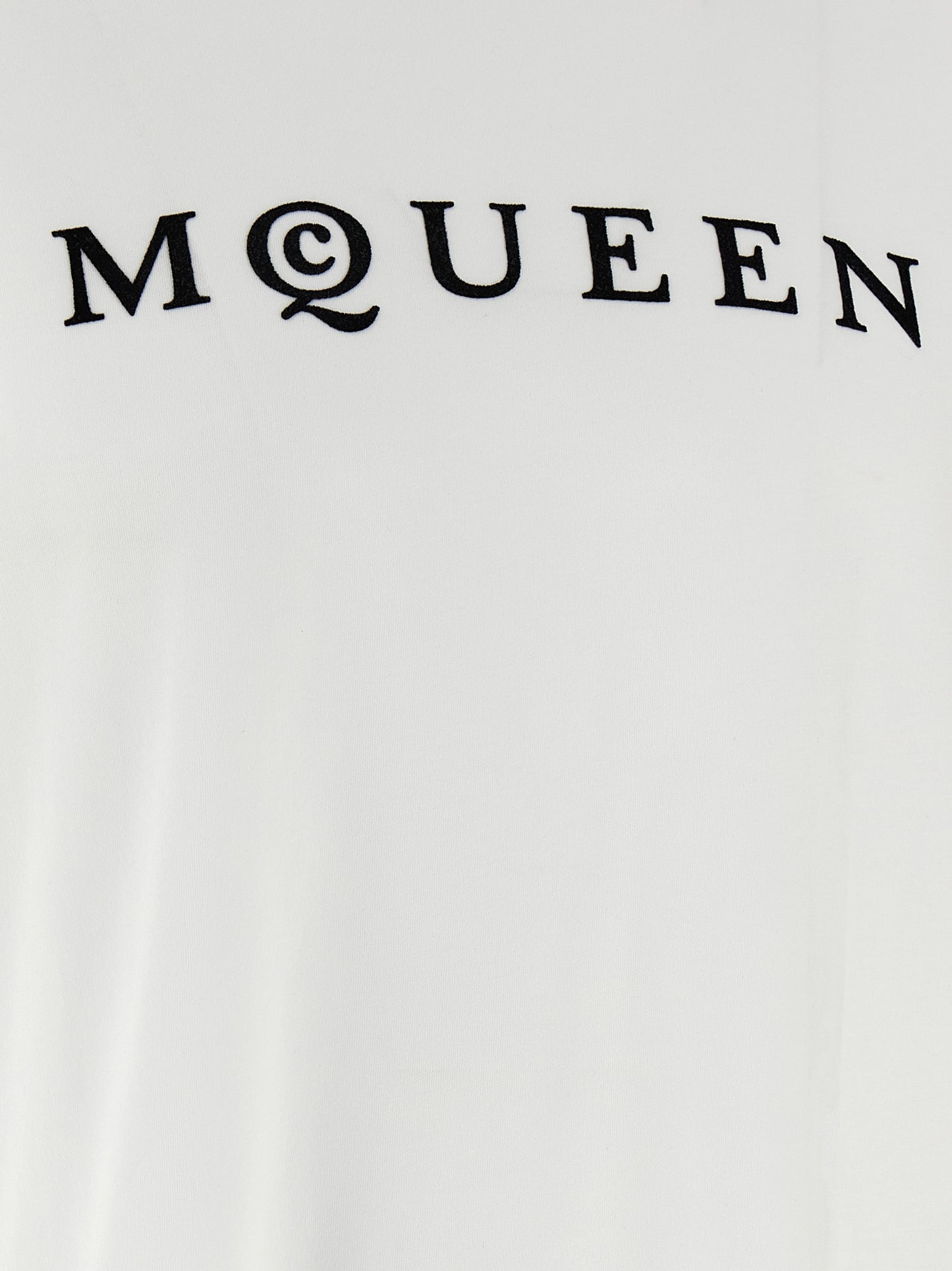 T-Shirt by Alexander McQueen for men in cotton bicolour, black & white showcases a fashionable silhouette, elegantly detailed with a fashionable and for a sophisticated, high-fashion look.