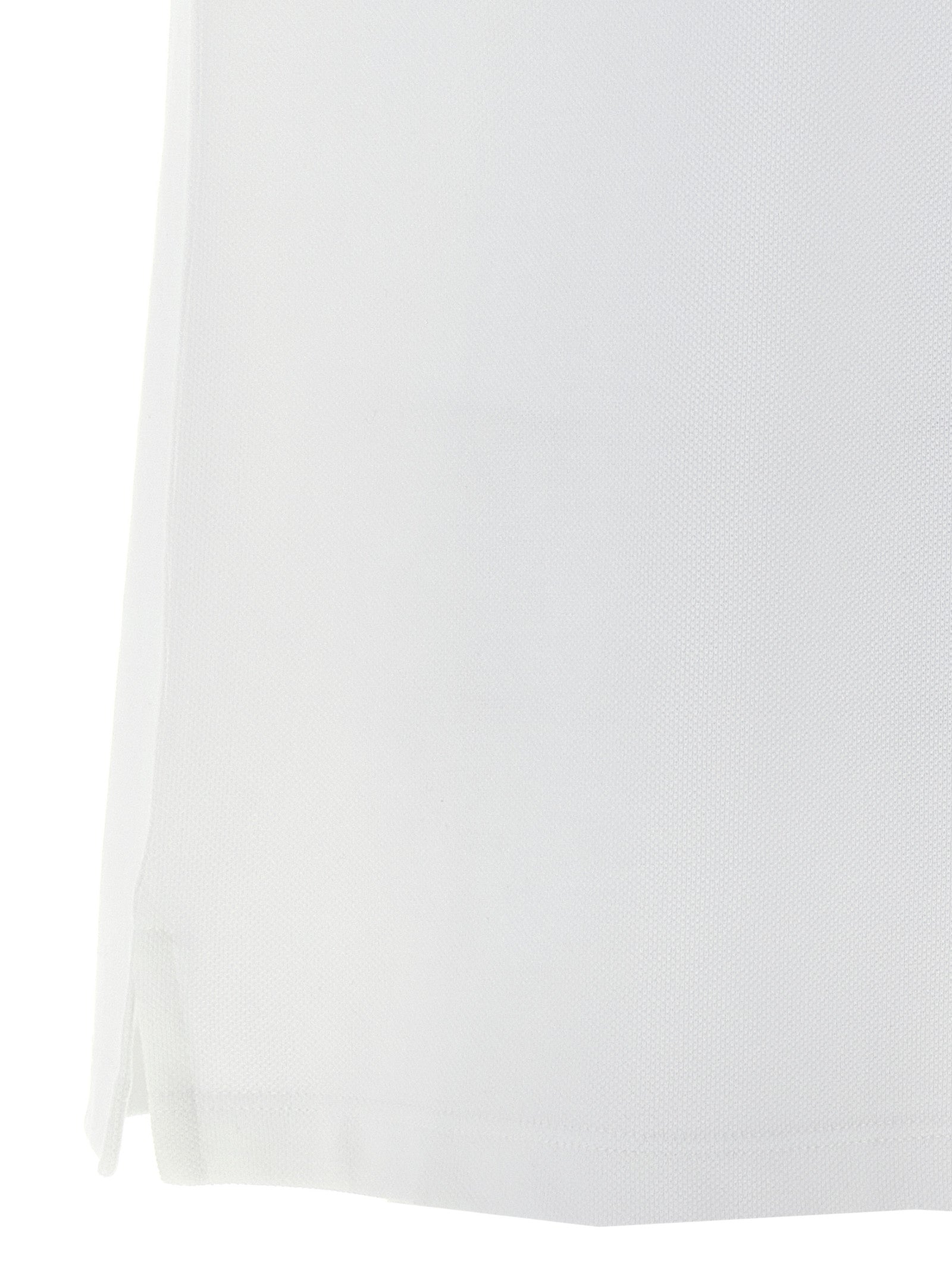 Polo Shirt by Alexander McQueen for men in cotton bicolour, black & white showcases a sharp silhouette, detailed with a refined and sharp for a sophisticated finish.