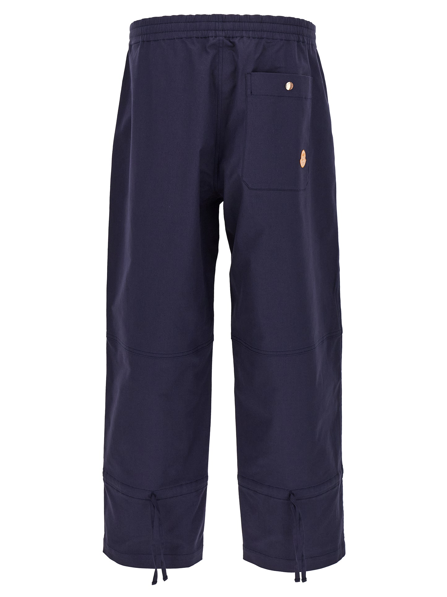 Trousers by MONCLER GENIUS for men in stretch cotton blue features a tailored silhouette with a tailored straight-leg & wide, defined by its long and a sophisticated .