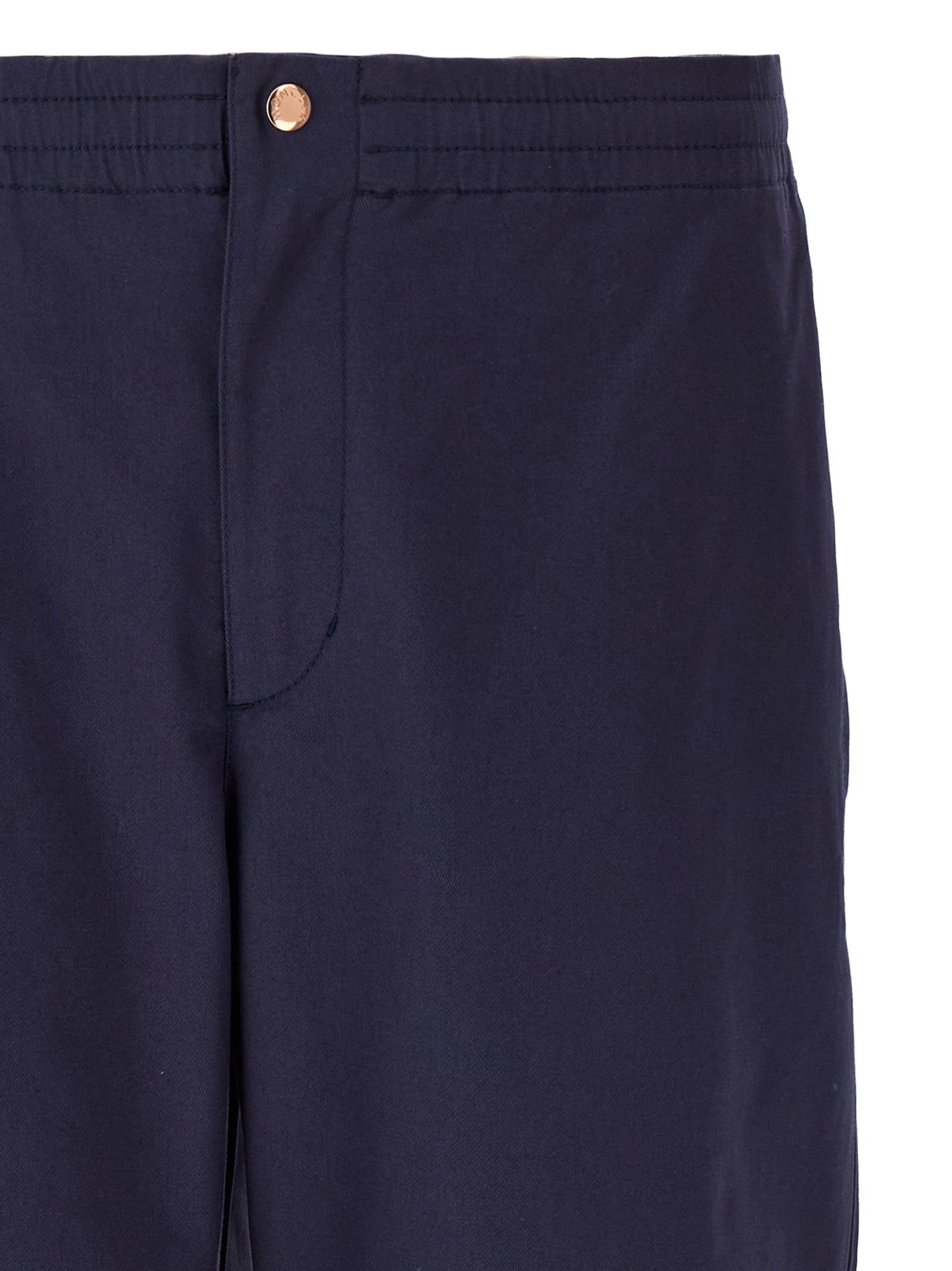 Trousers by MONCLER GENIUS for men in stretch cotton blue presents a perennial silhouette, meticulously tailored with a straight-leg & wide cut, long finish, and an elegant .