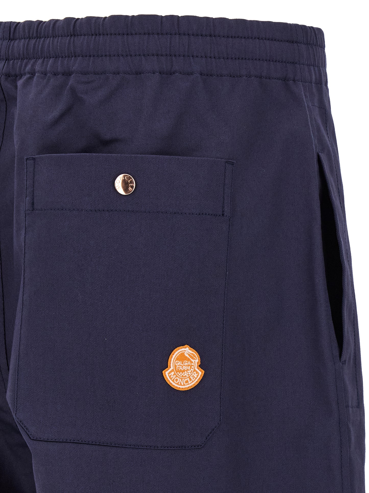 Trousers by MONCLER GENIUS for men in stretch cotton blue presents a smart silhouette, meticulously detailed with a smart straight-leg & wide, a smart long, and a smart .