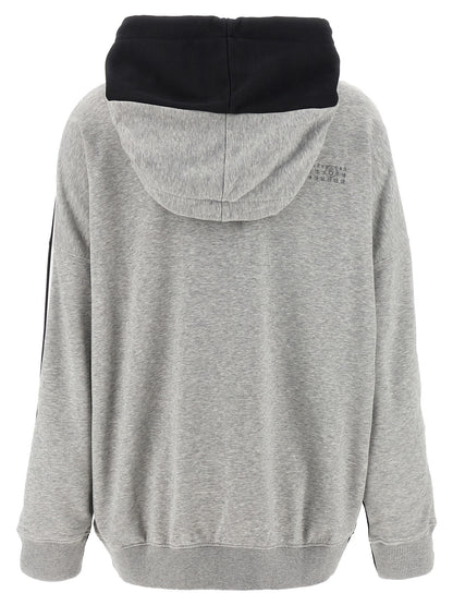 Sweatshirt Hoodie by MM6 Maison Margiela for women in cotton polyester multicolor, signature & print features a slouchy chic silhouette, detailed with a slouchy chic and a signature hooded neckline for an elevated aesthetic.
