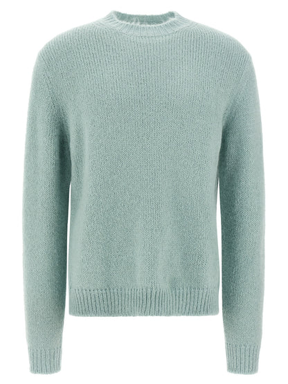 Cardigan by Jil Sander for men in polyamide leather & alpaca wool light-blue presents a textural silhouette, artfully finished with a textural crew neckline and long-sleeve for a sophisticated, textural look.