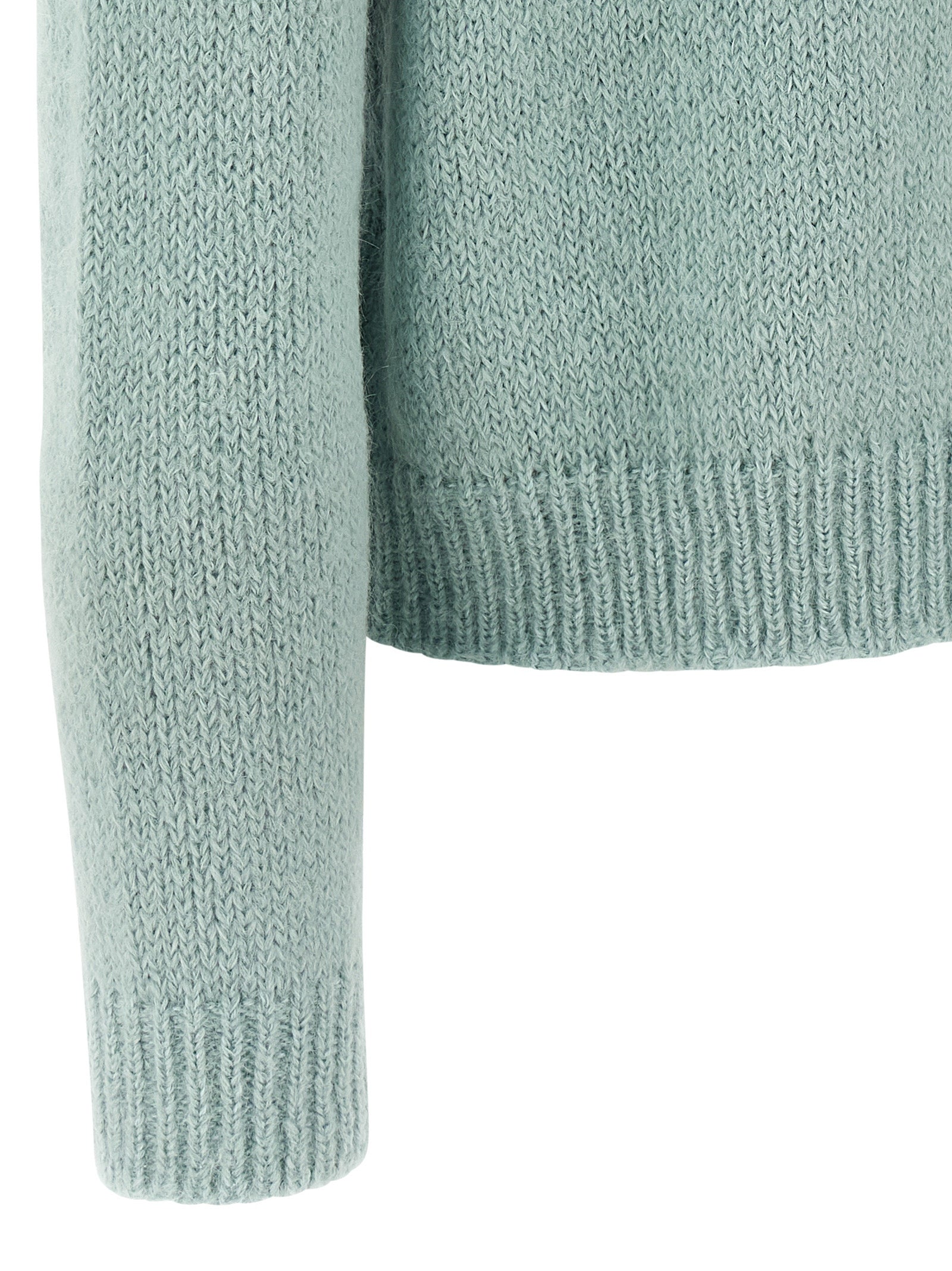 Cardigan by Jil Sander for men in polyamide leather & alpaca wool light-blue features a nuanced silhouette with a refined and nuanced detailing for a sophisticated look.