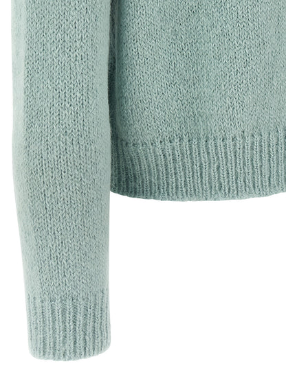Cardigan by Jil Sander for men in polyamide leather & alpaca wool light-blue features a nuanced silhouette with a refined and nuanced detailing for a sophisticated look.