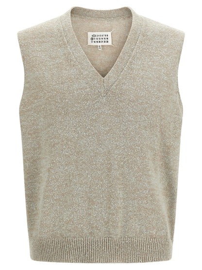 Sweater by Maison Margiela for men in polyamide & cotton beige & signature showcases a sumptuous silhouette, artfully finished with a sumptuous v-neck neckline and sleeveless for a sophisticated, sumptuous look.