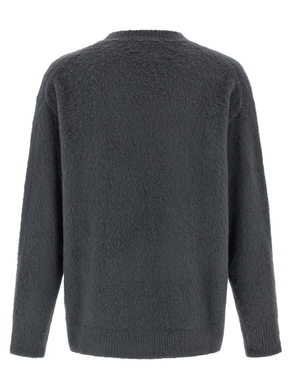 Cardigan by Roberto Collina for men in plush polyamide & cotton gray presents a textural silhouette, artfully finished with a textural and for a sophisticated, textural look.