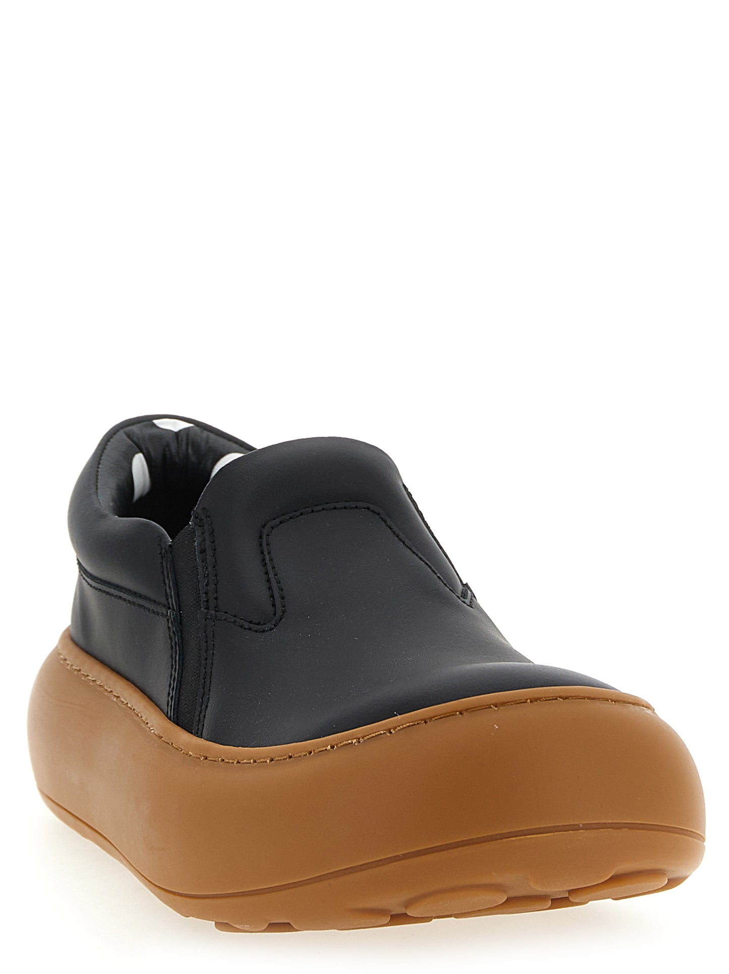 Sneakers by Moschino for women in leather & rubber black & print presents a impeccable silhouette as Ollie Women's Slip On Chunky Leather & Rubber Sneakers, expertly defined by a impeccable slip-on chunky style for a impeccable, high-fashion look.