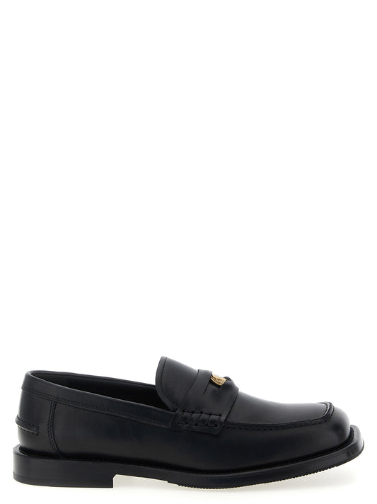 Loafer Slip-On Shoes by Moschino for men in leather & velvet black features an ergonomic silhouette, perfectly showcasing Men's Leather & Velvet Loafer Slip-On Shoes with its distinct and elegant .