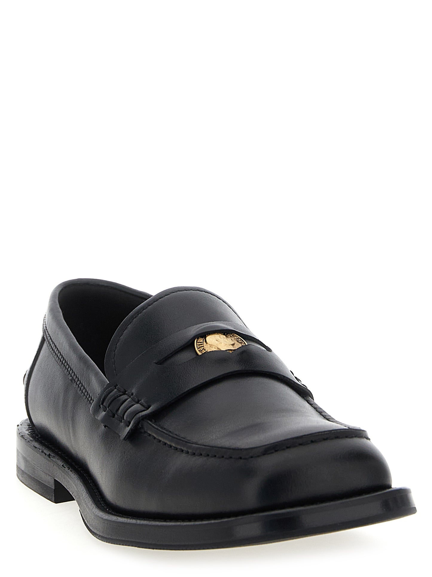 Loafer Slip-On Shoes by Moschino for men in leather & velvet black features an effortless chic silhouette, showcasing the Men's Leather & Velvet Loafer Slip-On Shoes design with an effortless chic and a for a effortless chic look.