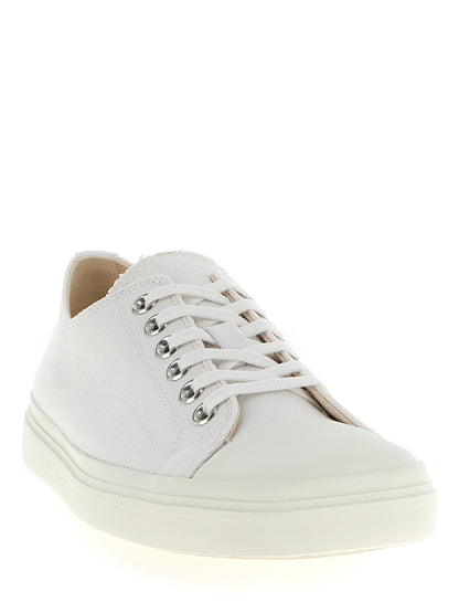 Sneakers by Moschino for men in cotton & rubber white features an timeless silhouette from the Men's Low Top Cotton & Rubber Sneakers collection, showcasing a signature low-top style with an timeless finish.