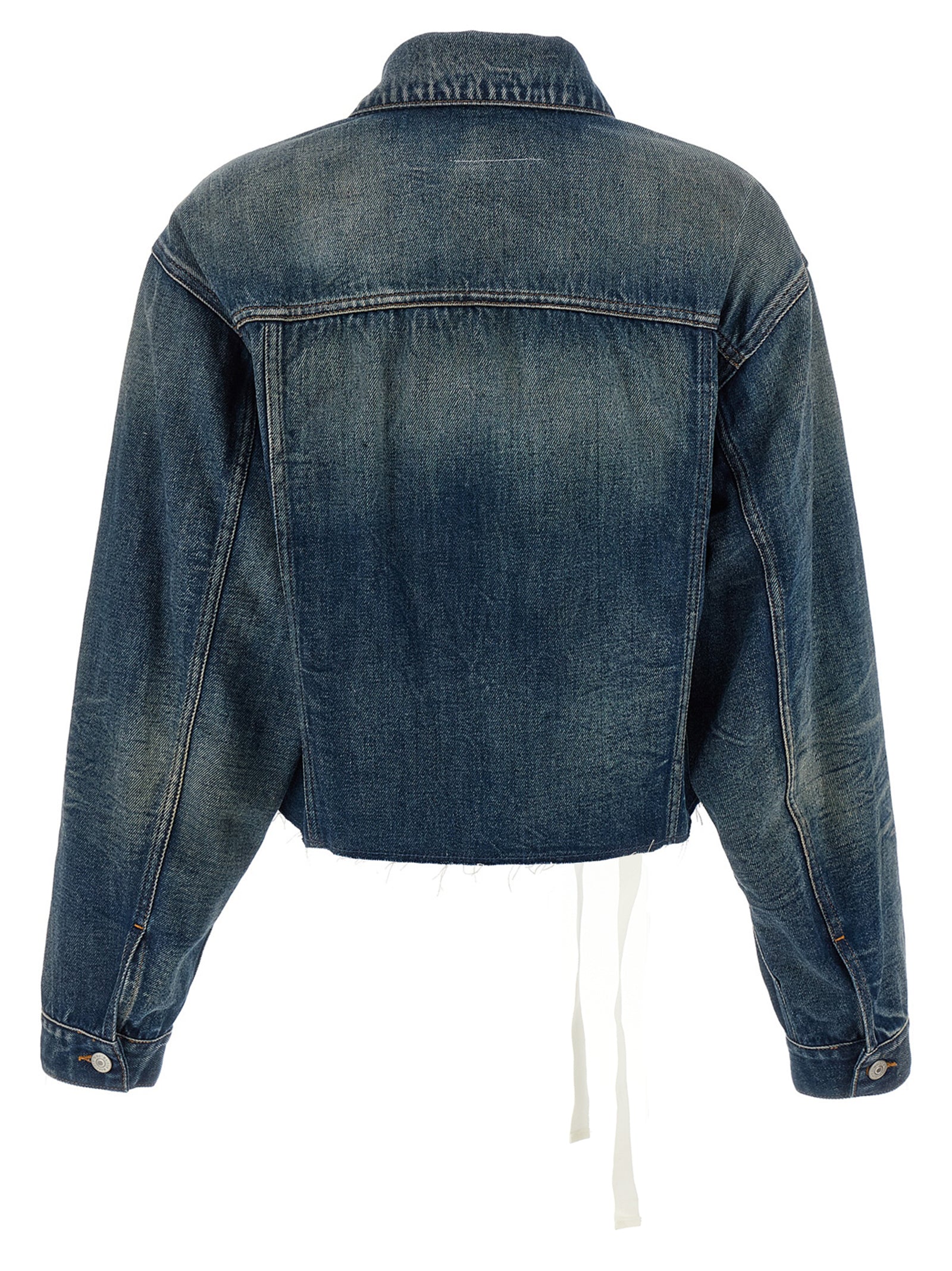 Trucker Jacket by MM6 Maison Margiela for women in denim cotton blue presents a effortlessly chic silhouette, showcasing a sophisticated asymmetric shirt-collar neckline and premium pockets for a truly effortlessly chic finish.