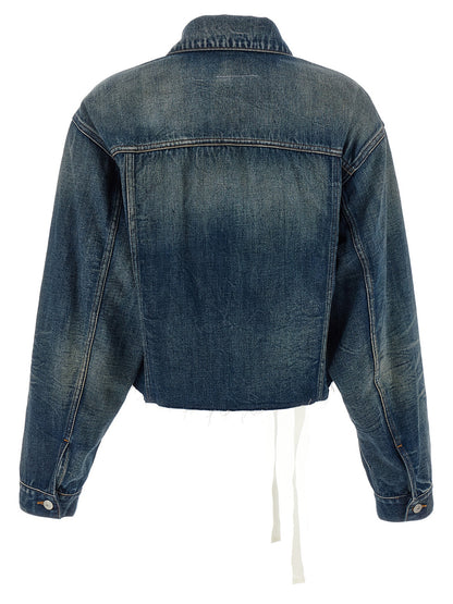 Trucker Jacket by MM6 Maison Margiela for women in denim cotton blue presents a effortlessly chic silhouette, showcasing a sophisticated asymmetric shirt-collar neckline and premium pockets for a truly effortlessly chic finish.
