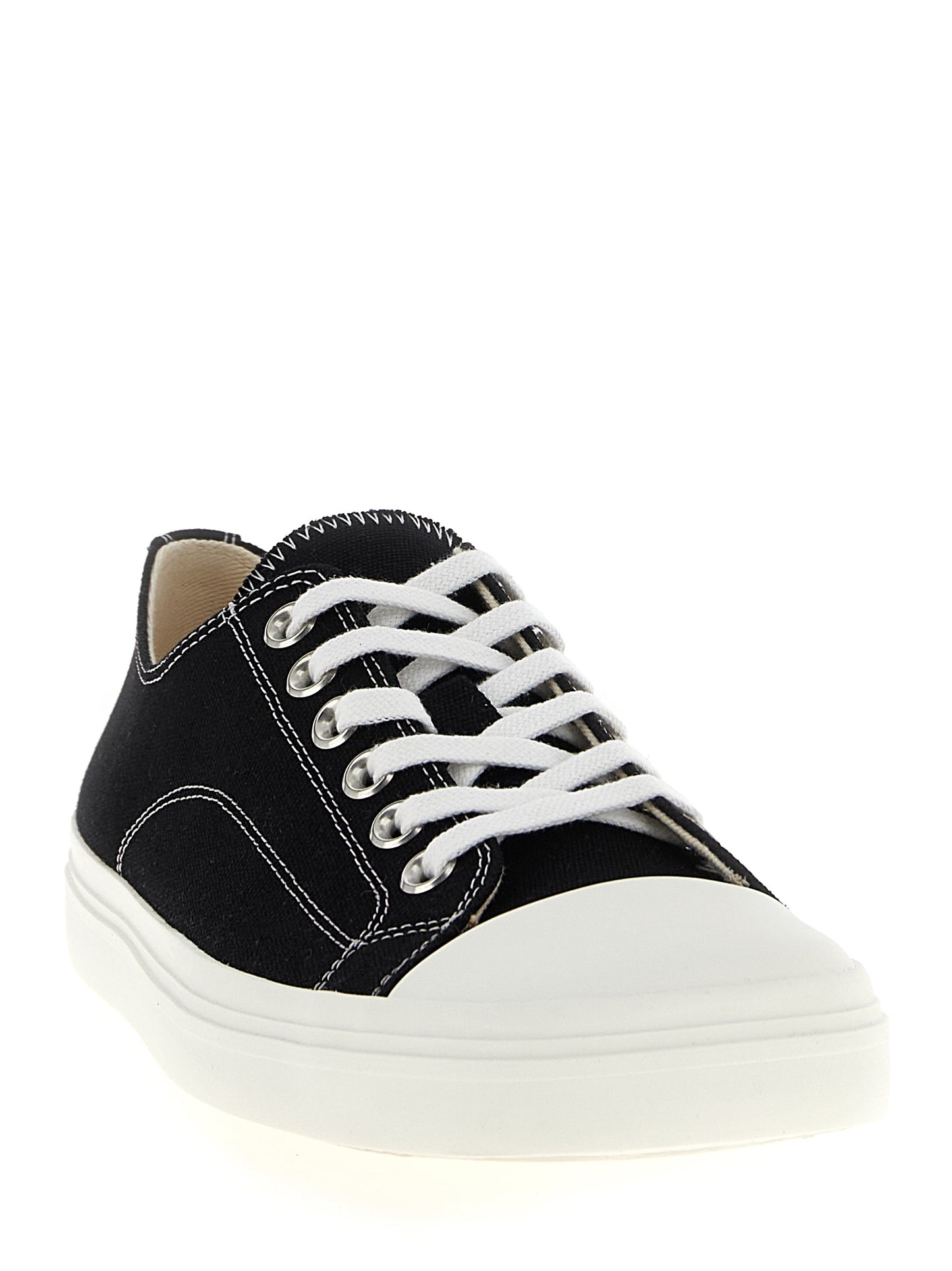 Sneakers by Moschino for men in cotton canvas bicolour, black & white presents a sumptuous silhouette, artfully capturing the essence of the Men's Fashion Cotton Canvas Sneakers with its sumptuous fashion style design.