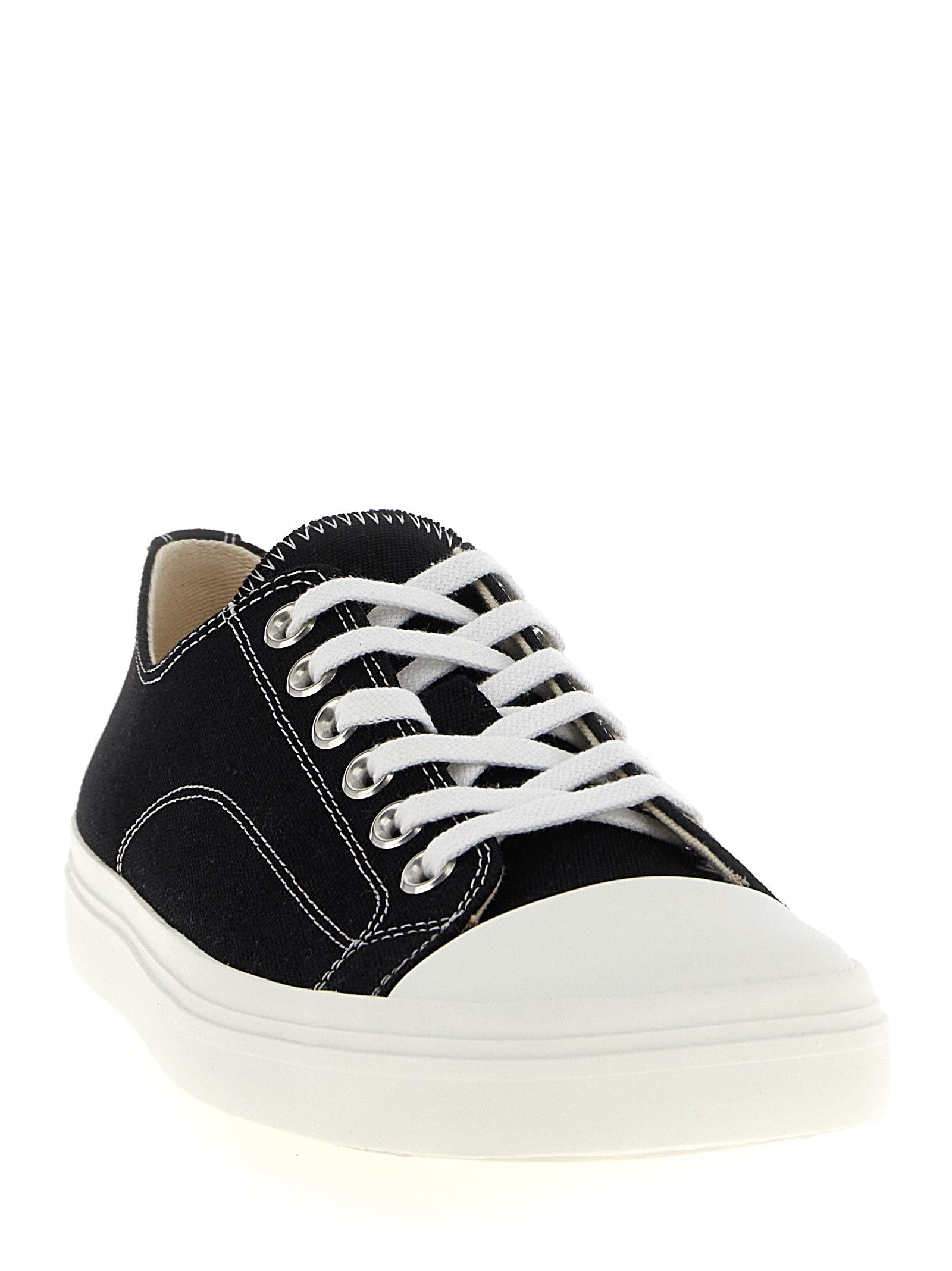 Sneakers by Moschino for men in cotton canvas bicolour, black & white presents a sumptuous silhouette, artfully capturing the essence of the Men's Fashion Cotton Canvas Sneakers with its sumptuous fashion style design.