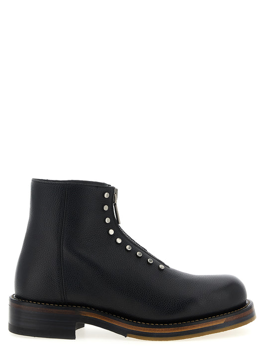 Ankle Boots by Alexander McQueen for men in calfskin leather black features an dynamic silhouette, showcasing the dynamic Men's Calfskin Leather Ankle Boots design with its distinctive and elegant .