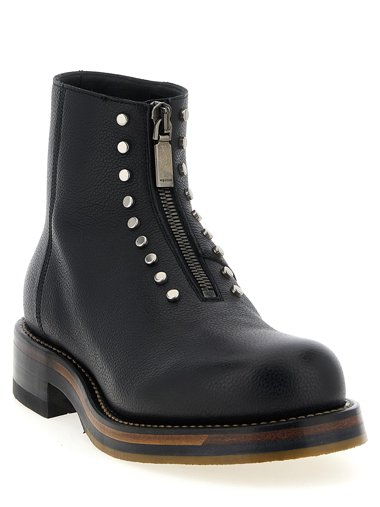 Ankle Boots by Alexander McQueen for men in calfskin leather black features an effortless chic silhouette from the Men's Calfskin Leather Ankle Boots collection, showcasing a effortless chic and refined for an effortless chic look.