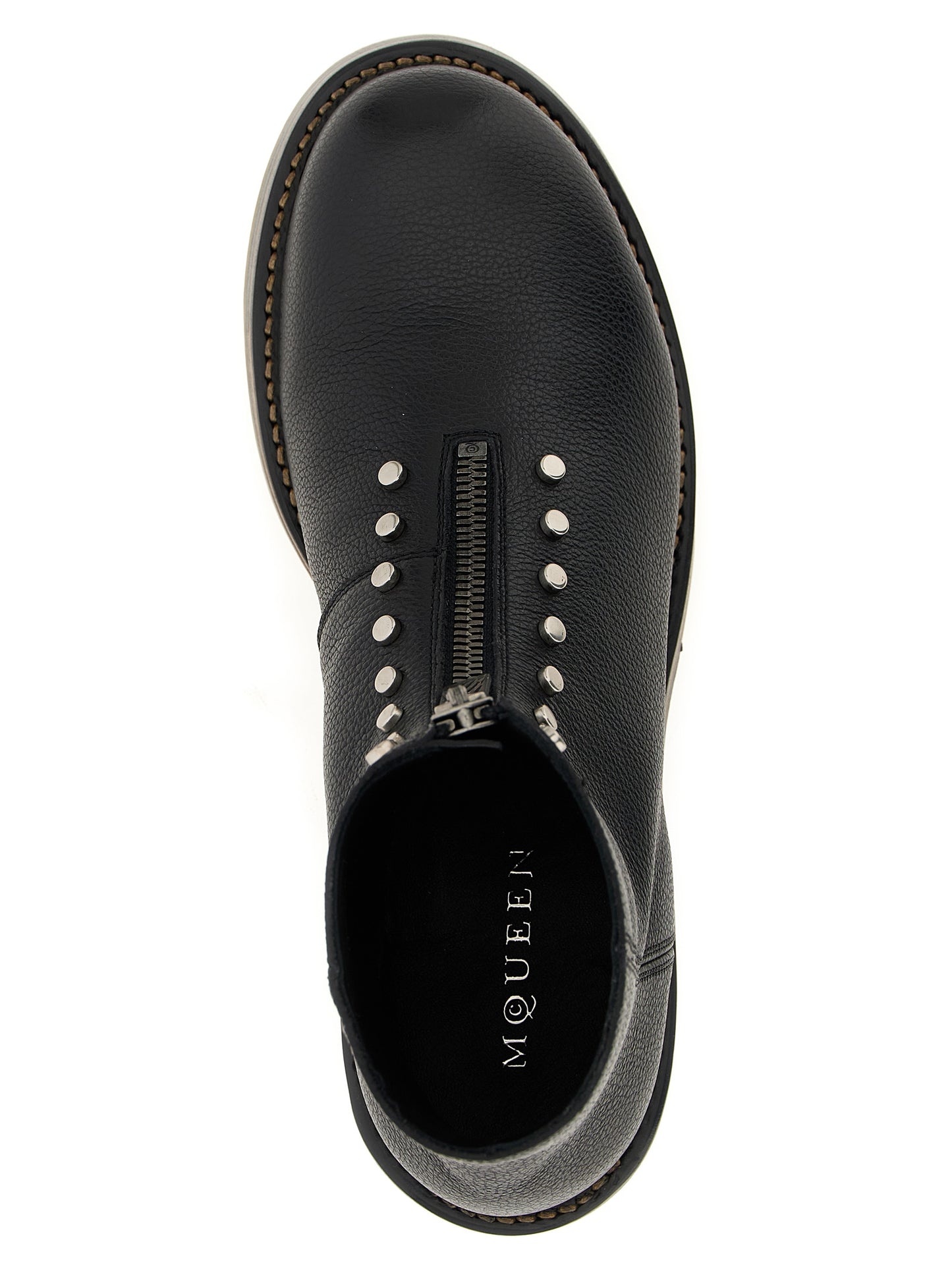 Ankle Boots by Alexander McQueen for men in calfskin leather black features an effortless chic silhouette from the Men's Calfskin Leather Ankle Boots collection, showcasing a effortless chic and refined for an effortless chic look.