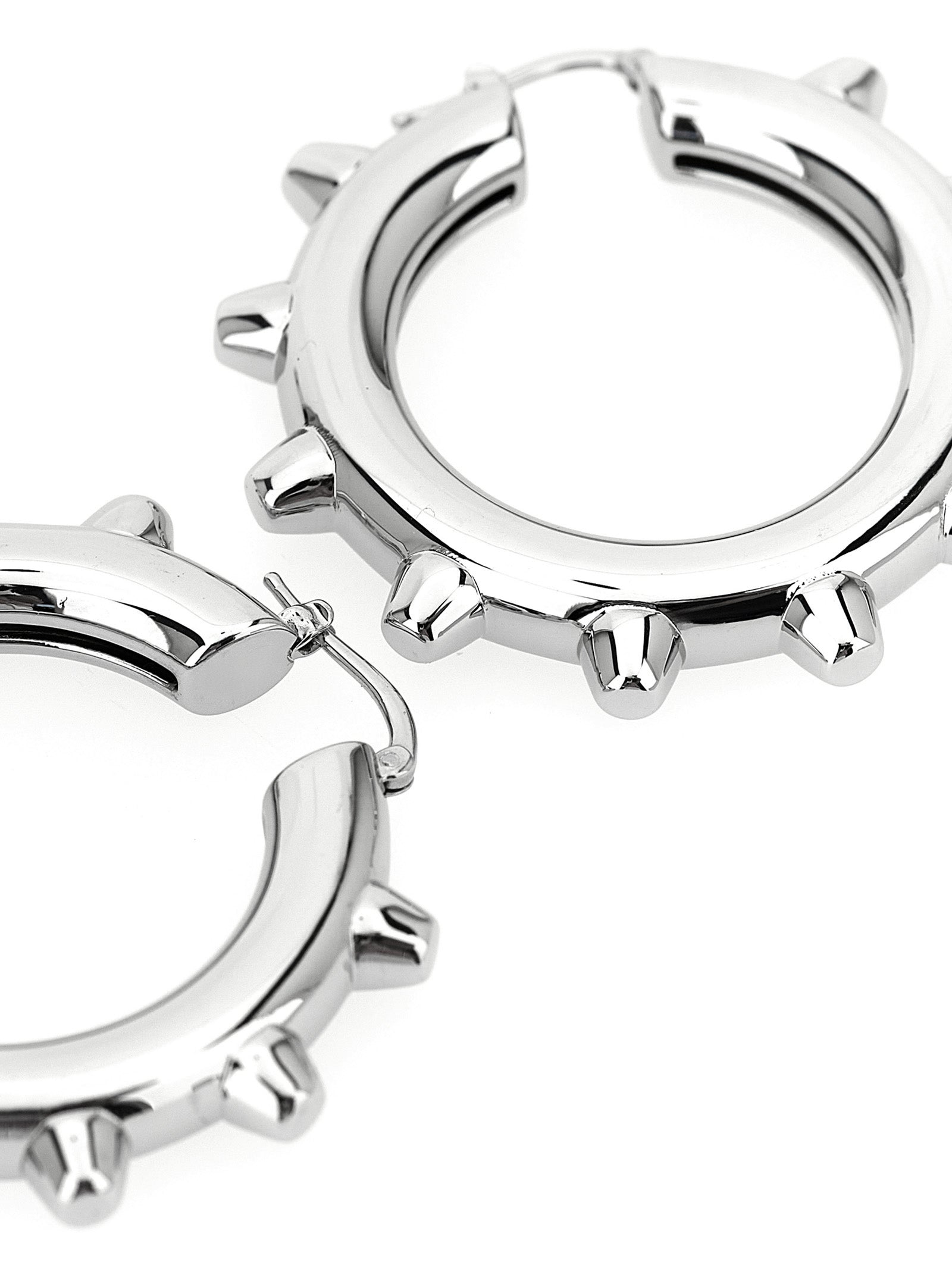 Earrings by Jil Sander for women in cotton silver & hooped presents a resplendent silhouette, artfully capturing the essence of the Women's Hoop Silver Brass Earrings with a resplendent hoop for a sophisticated look.