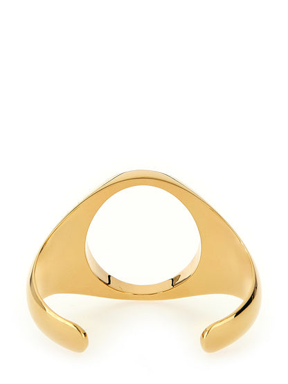 Bracelet by MM6 Maison Margiela for women in cotton and gold showcases a refined silhouette, artfully capturing the essence of Women's Gold Brass Bracelet with its refined .