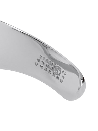 Bracelet by MM6 Maison Margiela for women in cotton silver features a architectural silhouette, elegantly showcasing a architectural that defines the Women's Silver Brass Bracelet aesthetic.
