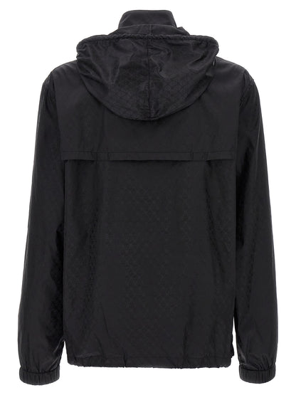 Hooded Windbreaker Jacket by Alexander McQueen for men in nylon black, patterned & jacquard presents a resilient silhouette, artfully detailed with a sophisticated hooded high-neck neckline and functional pockets, hooded & windproof for a resilient finish.