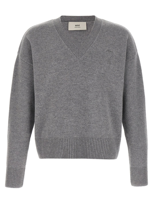 Cardigan by Ami Paris for men in cashmere gray features an impeccable silhouette, showcasing a sophisticated v-neck neckline and detail for a truly impeccable finish.