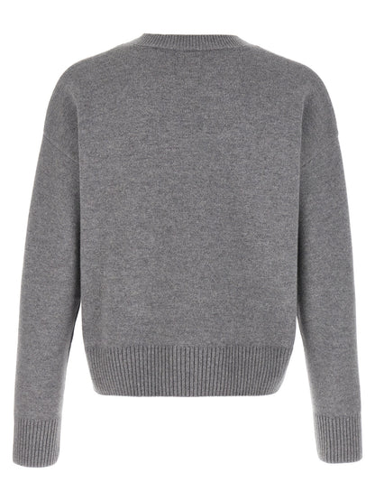 Cardigan by Ami Paris for men in cashmere gray features a nuanced silhouette with a refined v-neck neckline and nuanced detailing for a sophisticated look.