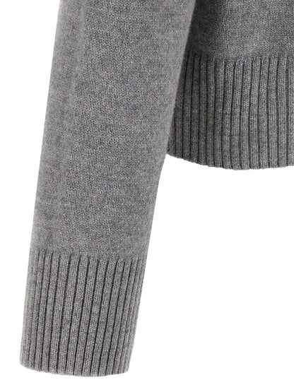 Cardigan by Ami Paris for men in cashmere gray showcases a captivating silhouette, artfully detailed with a captivating and for a truly sophisticated captivating look.