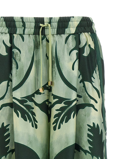Casual Pants by F.R.S. - FOR RESTLESS SLEEPERS for women in silk twill bicolour, green, floral & print presents a tailored silhouette, showcasing a tailored straight-leg & wide and long cut with a refined for a truly tailored aesthetic.
