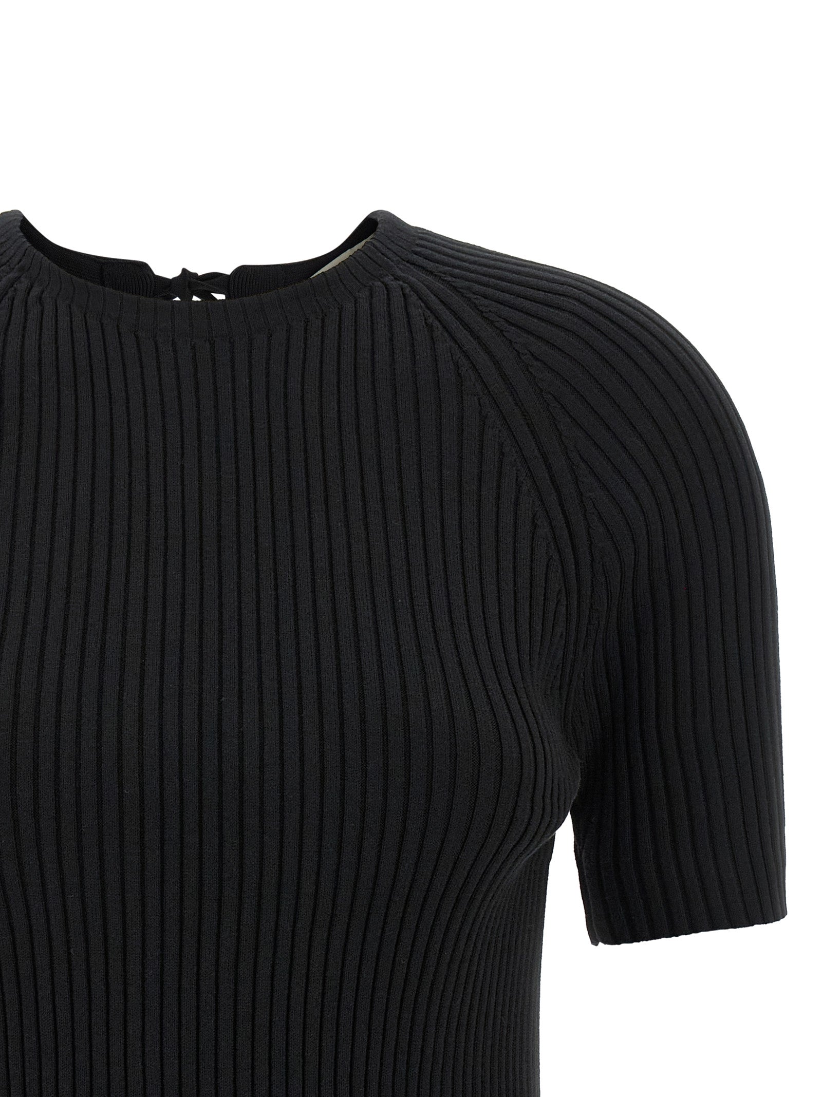 Cardigan by Tory Burch for women in stretch polyamide cotton black features a dramatic silhouette, showcasing a sophisticated crew neckline and dramatic detail for a timeless, premium look.
