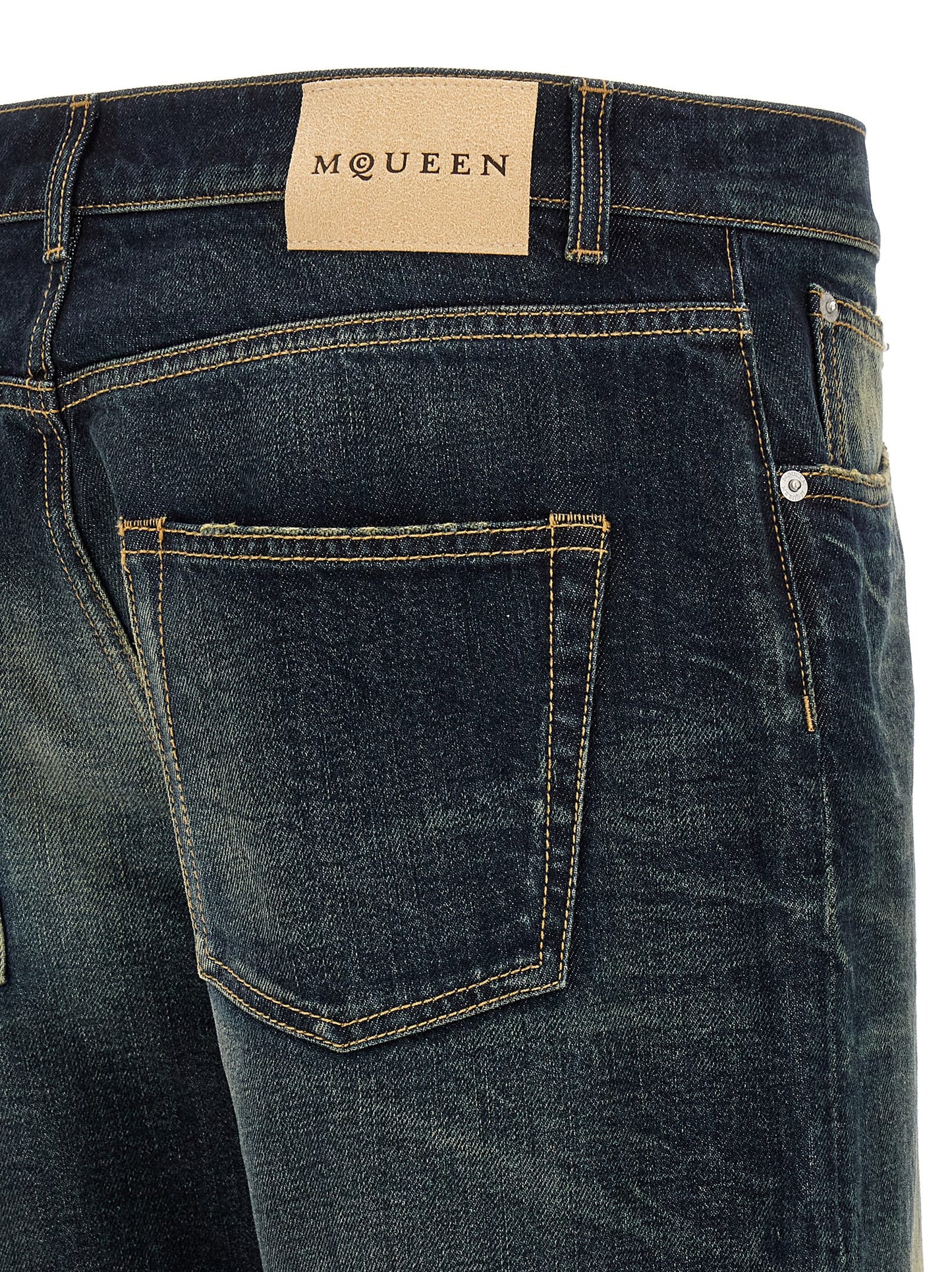 Jeans by Alexander McQueen for men in denim cotton & suede leather blue features an refined tailoring silhouette, showcasing a premium straight-leg & wide with a and long cut for a refined tailoring look.