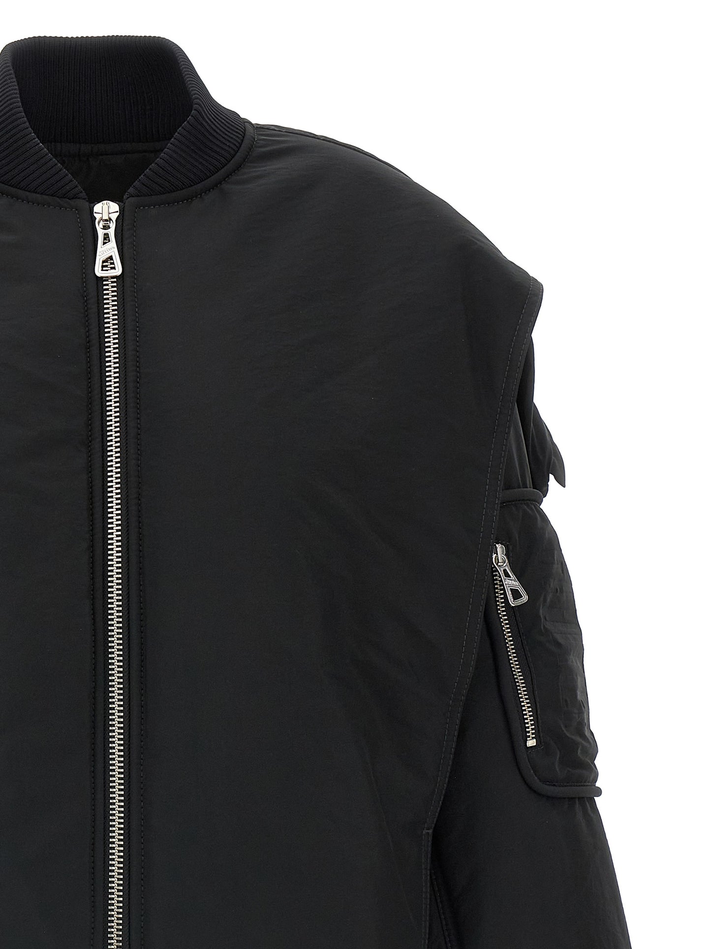 Hooded Bomber Jacket by Jean Paul Gaultier for women in polyester polyurethane polyethylene black showcases a bohemian silhouette, artfully detailed with a bohemian hooded neckline and signature pockets, hooded & insulated for a truly bohemian finish.