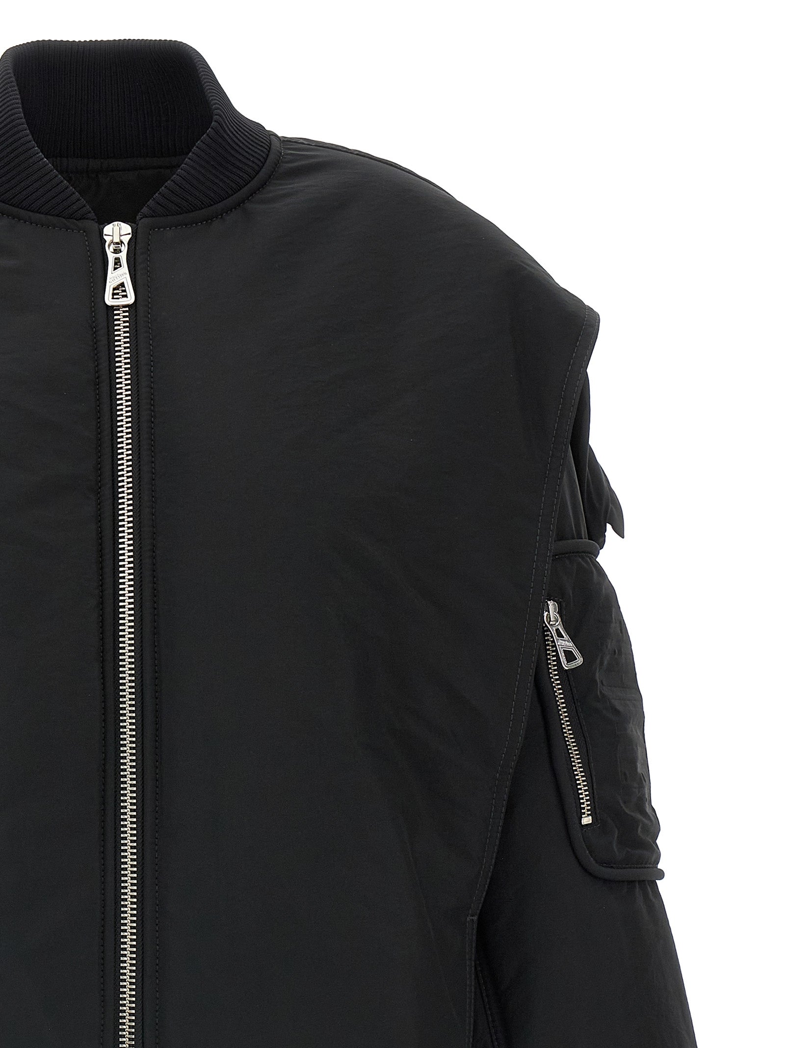 Hooded Bomber Jacket by Jean Paul Gaultier for women in polyester polyurethane polyethylene black showcases a bohemian silhouette, artfully detailed with a bohemian hooded neckline and signature pockets, hooded & insulated for a truly bohemian finish.