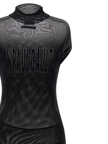 Dress by Jean Paul Gaultier for women in polyamide black, transparent & patterned features an sultry silhouette defined by a and , falling to an sultry long for a sultry look.