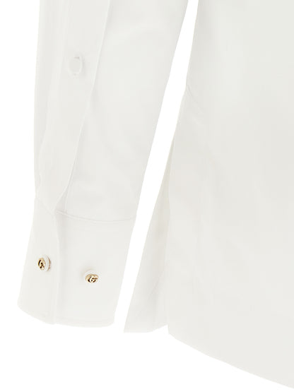 Blouse by Gucci for women in cotton white & striped features an architectural silhouette with a refined and elegant for a architectural look.