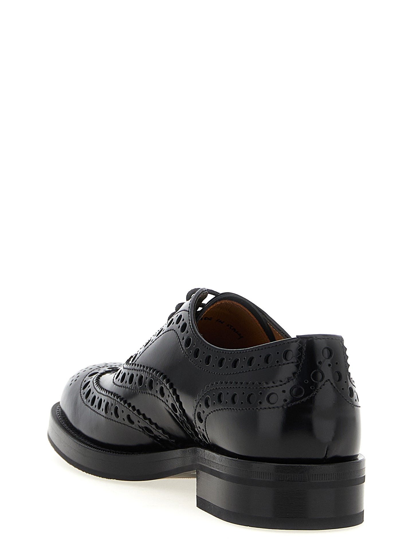 Brogue Brogues Lace-Up Shoes by Church's for unisex in calfskin leather black features an effortless chic silhouette, showcasing the Unisex Calfskin Leather Brogue Brogues Lace-Up Shoes design with an effortless chic and a for a effortless chic look.