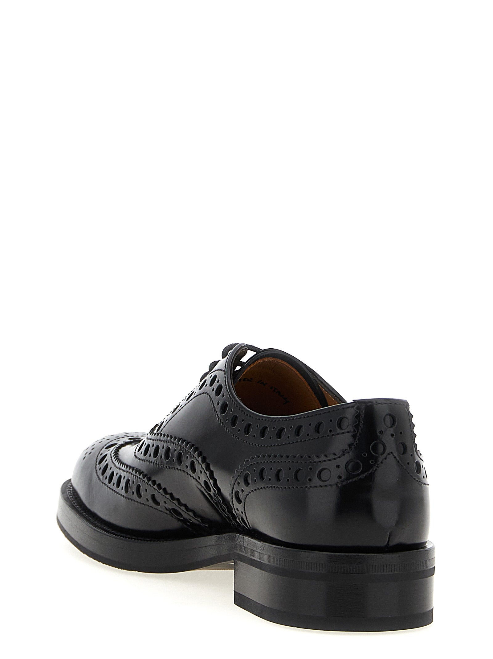 Brogue Brogues Lace-Up Shoes by Church's for unisex in calfskin leather black features an effortless chic silhouette, showcasing the Unisex Calfskin Leather Brogue Brogues Lace-Up Shoes design with an effortless chic and a for a effortless chic look.