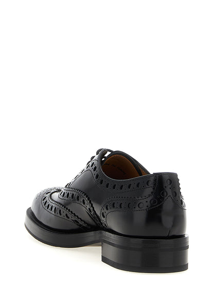 Brogue Brogues Lace-Up Shoes by Church's for unisex in calfskin leather black features an effortless chic silhouette, showcasing the Unisex Calfskin Leather Brogue Brogues Lace-Up Shoes design with an effortless chic and a for a effortless chic look.