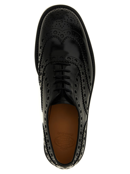 Brogue Brogues Lace-Up Shoes by Church's for unisex in calfskin leather black features an ergonomic silhouette, perfectly showcasing Unisex Calfskin Leather Brogue Brogues Lace-Up Shoes with its distinct and elegant .