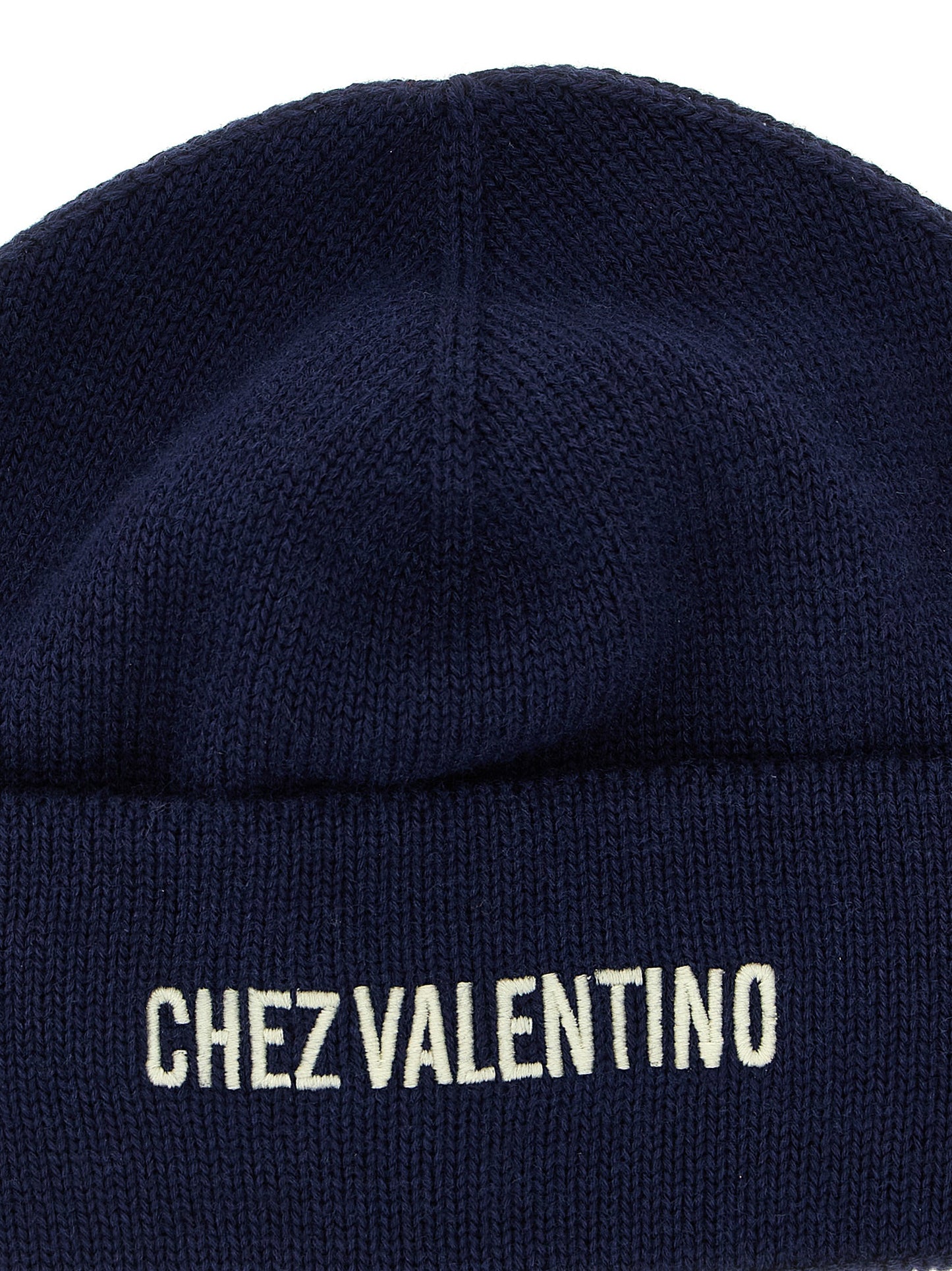 Beanie Hat by Valentino Garavani for men in virgin wool & cotton blue features a distinguished knit construction, showcasing the sophisticated silhouette and distinguished finish of the Virgin Wool & Cotton Beanie Hat.