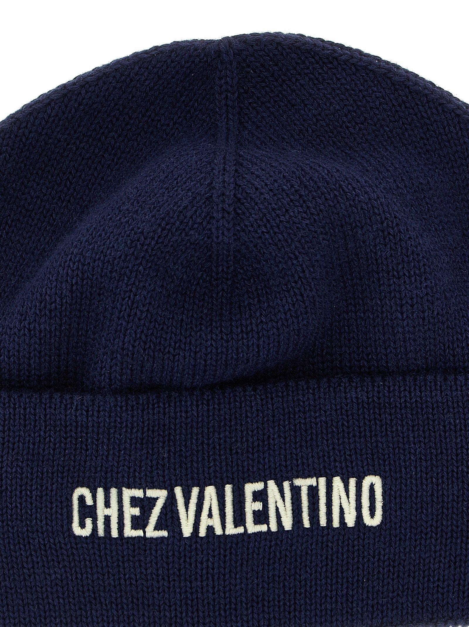 Beanie Hat by Valentino Garavani for men in virgin wool & cotton blue features a distinguished knit construction, showcasing the sophisticated silhouette and distinguished finish of the Virgin Wool & Cotton Beanie Hat.
