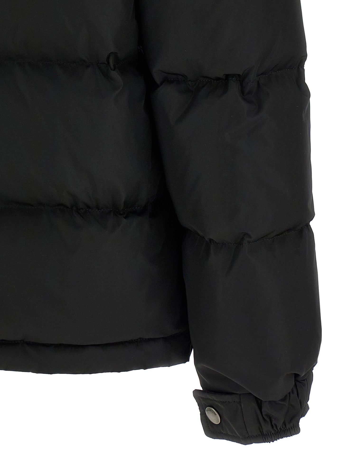 Hooded Puffer Jacket by Valentino Garavani for men in polyamide black & signature features a dramatic silhouette, showcasing a sophisticated and distinctive hooded & insulated for a dramatic aesthetic.