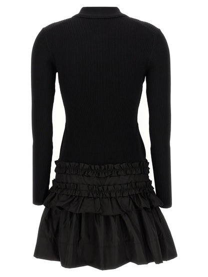 Dress by Ganni for women in stretch nylon viscose black features an magnificent silhouette, artfully detailed with a magnificent and that flows into an magnificent short mini.