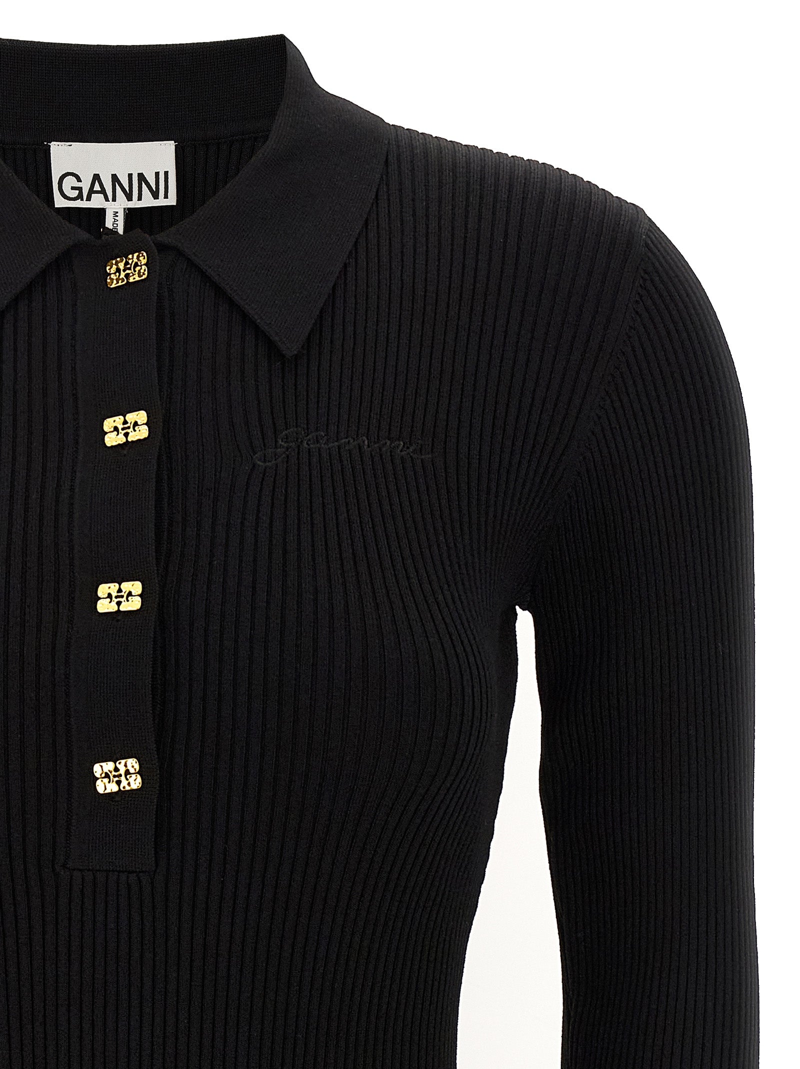 Dress by Ganni for women in stretch nylon viscose black features a dramatic silhouette, showcasing an elegant and that flows into a dramatic short mini.